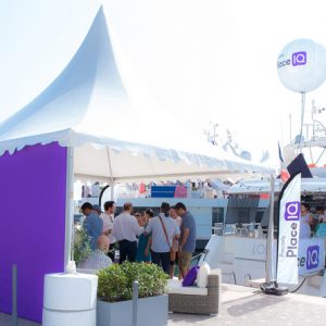 A tent as a welcome space in front of a yacht can greatly improve your Cannes event activation