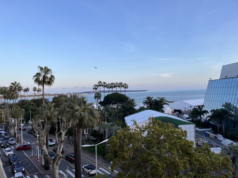View from an apartment in Cannes of the Croisette facing Palais des Festivals et des congrès with a sunset during a convention