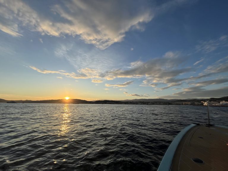 Luxury yacht at sunset near the Lerins Islands