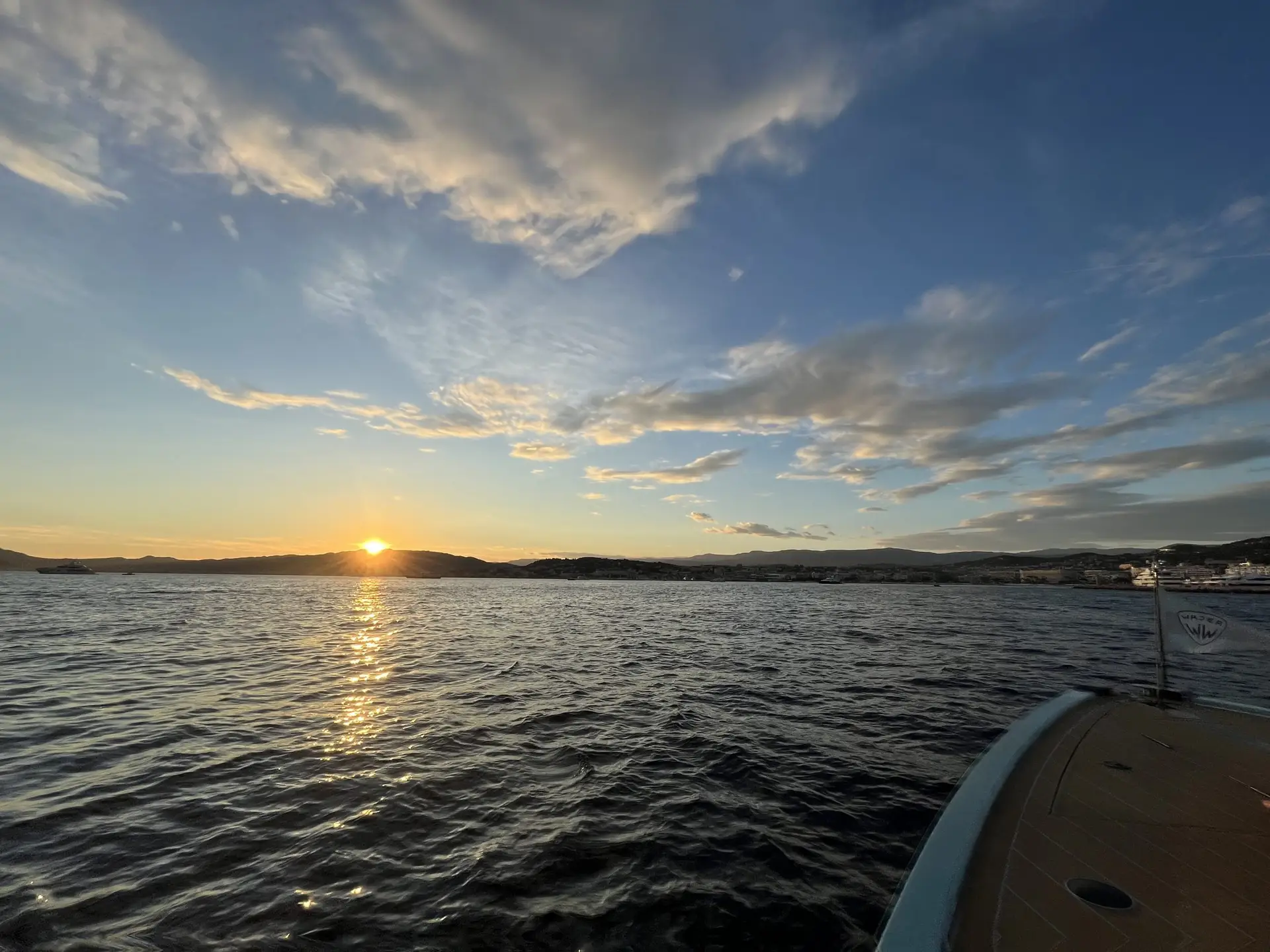 Luxury yacht at sunset near the Lérins Islands in Cannes