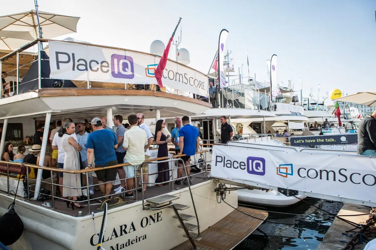 Guests at a cocktail reception on a yacht deck during Cannes Lions
