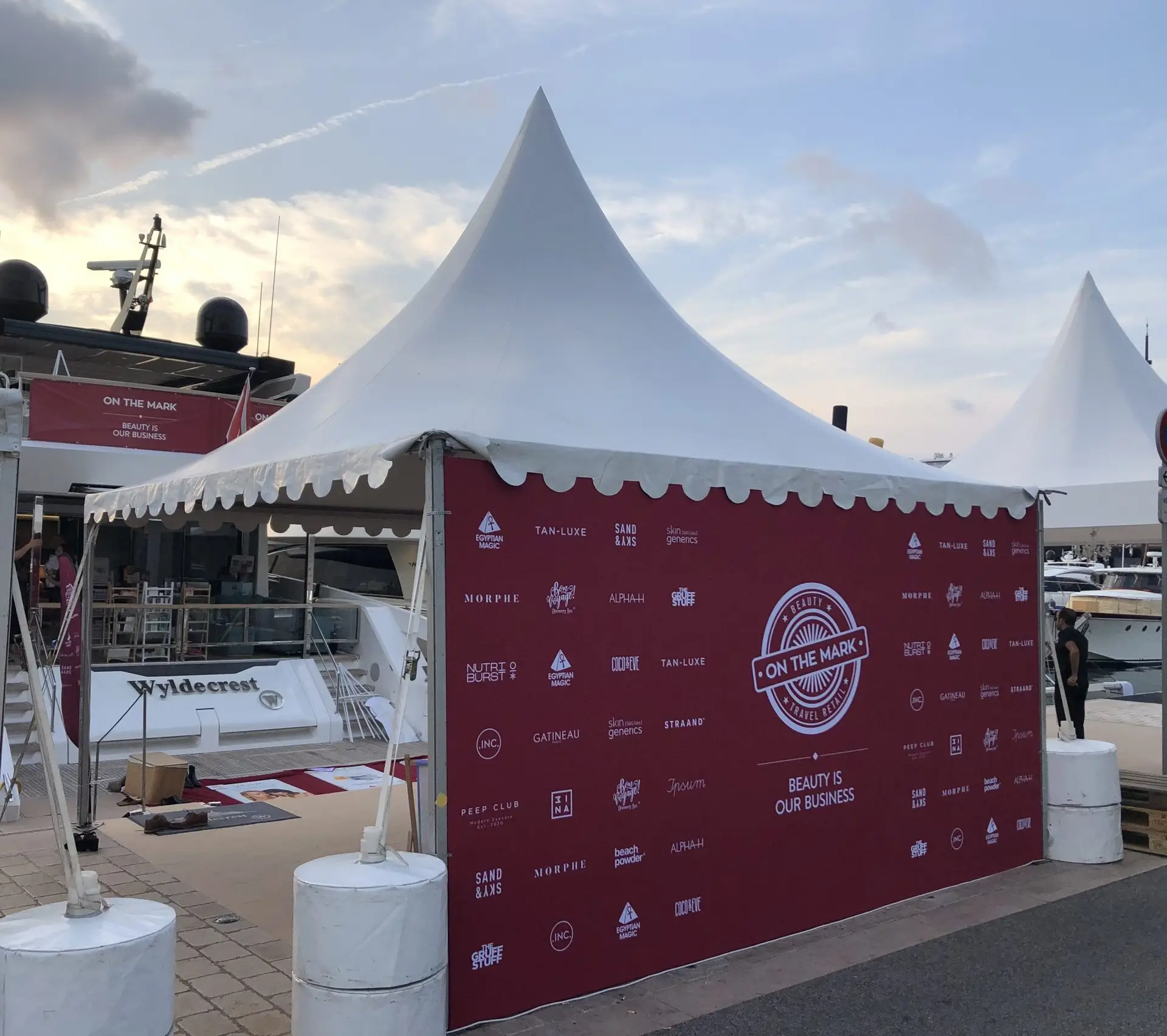 Dock tent next to a yacht at the TFWA event in Cannes