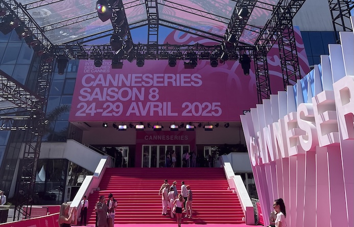 Cannes series pink carpet with guests walking up the steps