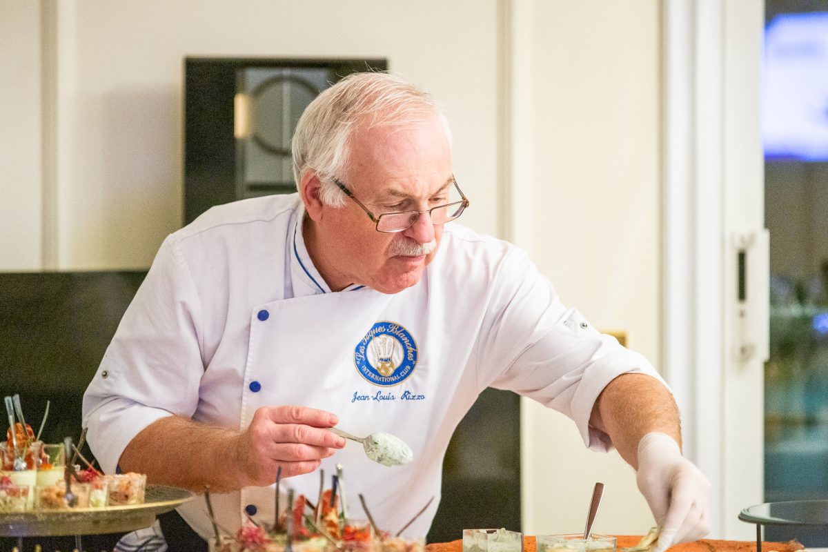 Chef preparing canapés for a reception on board a yacht in Cannes